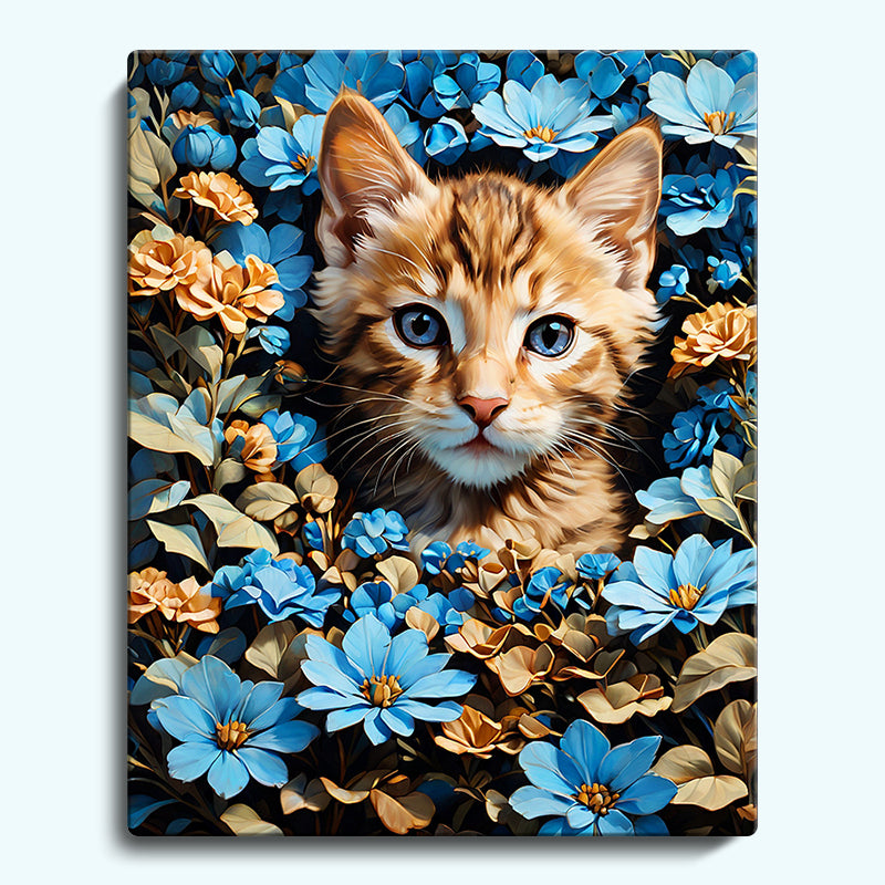 A cat and blue flowers